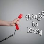 Hand holding a red telephone with text "things to know," representing A & W Plumbing and Heating’s sump pump services.